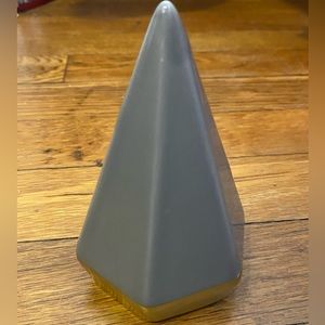 Gray and gold pyramid paper weight
